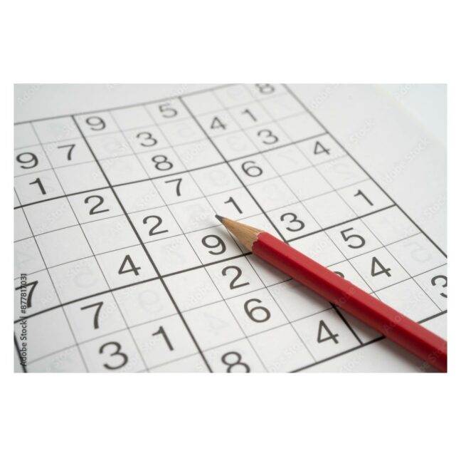 Sudoku puzzle grid with a pencil