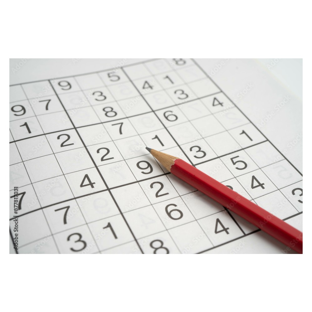 Sudoku puzzle grid with a pencil
