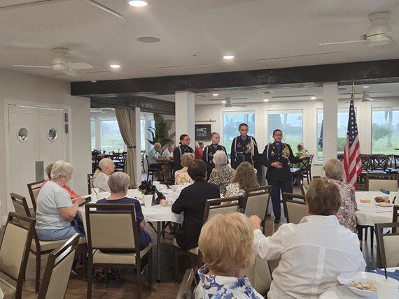 Whiskey Creek Ladies Club members at tables during the October meeting