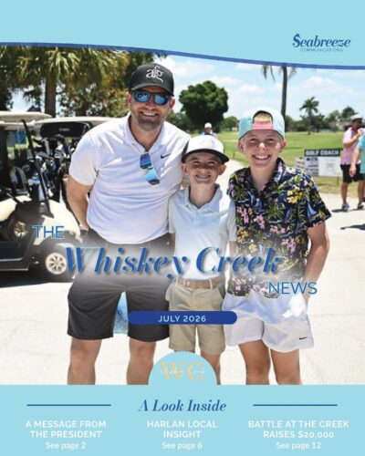 The Whiskey Creek News July 2026 cover — a man and two boys at a golf outing